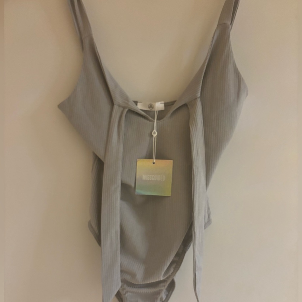 MISSGUIDED- NWT,Smooth,Shiny, Gray, Knot Front,Strappy Bodysuit SIZE 8.